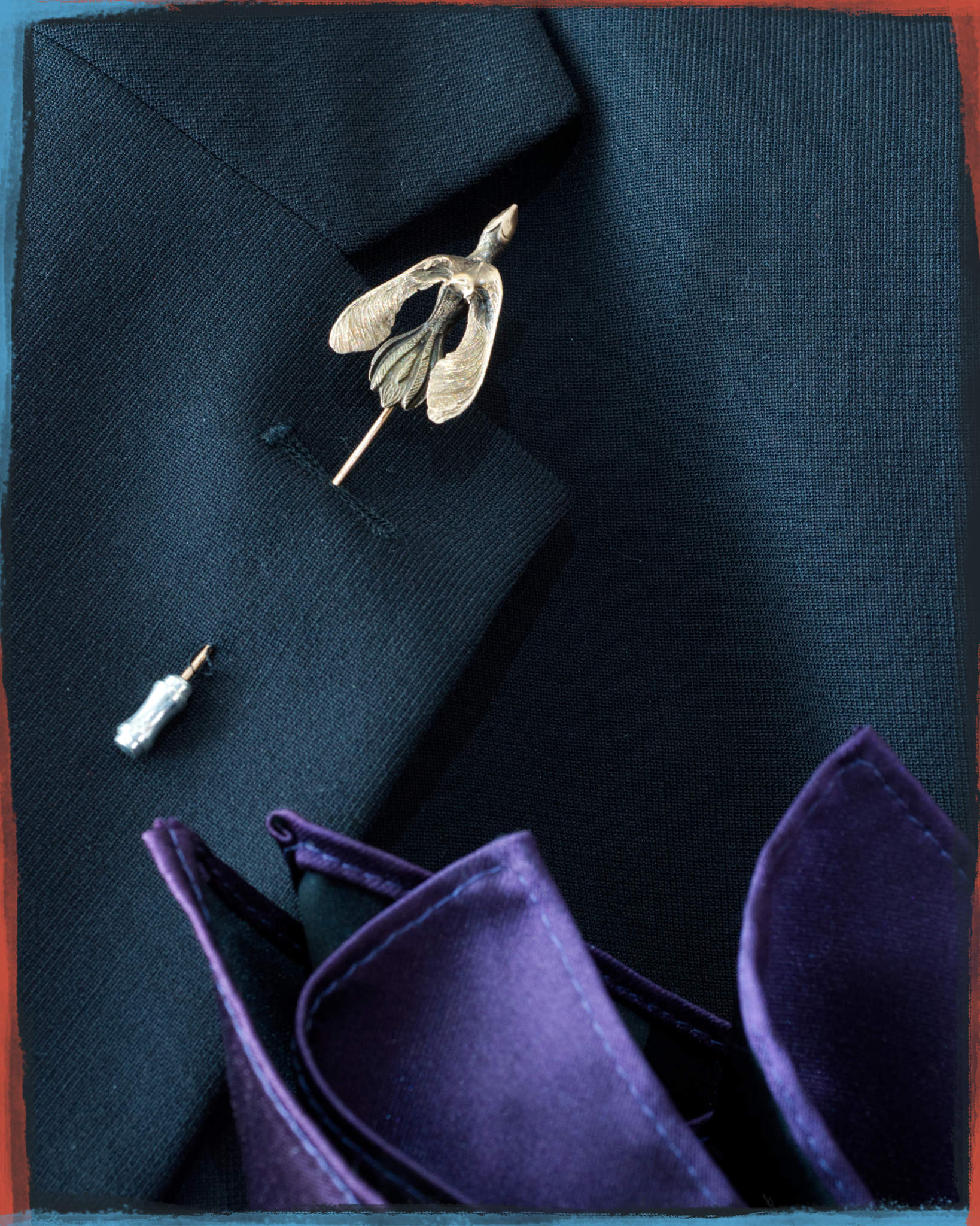 take_wing_bronze_pin_on_suit_lapel