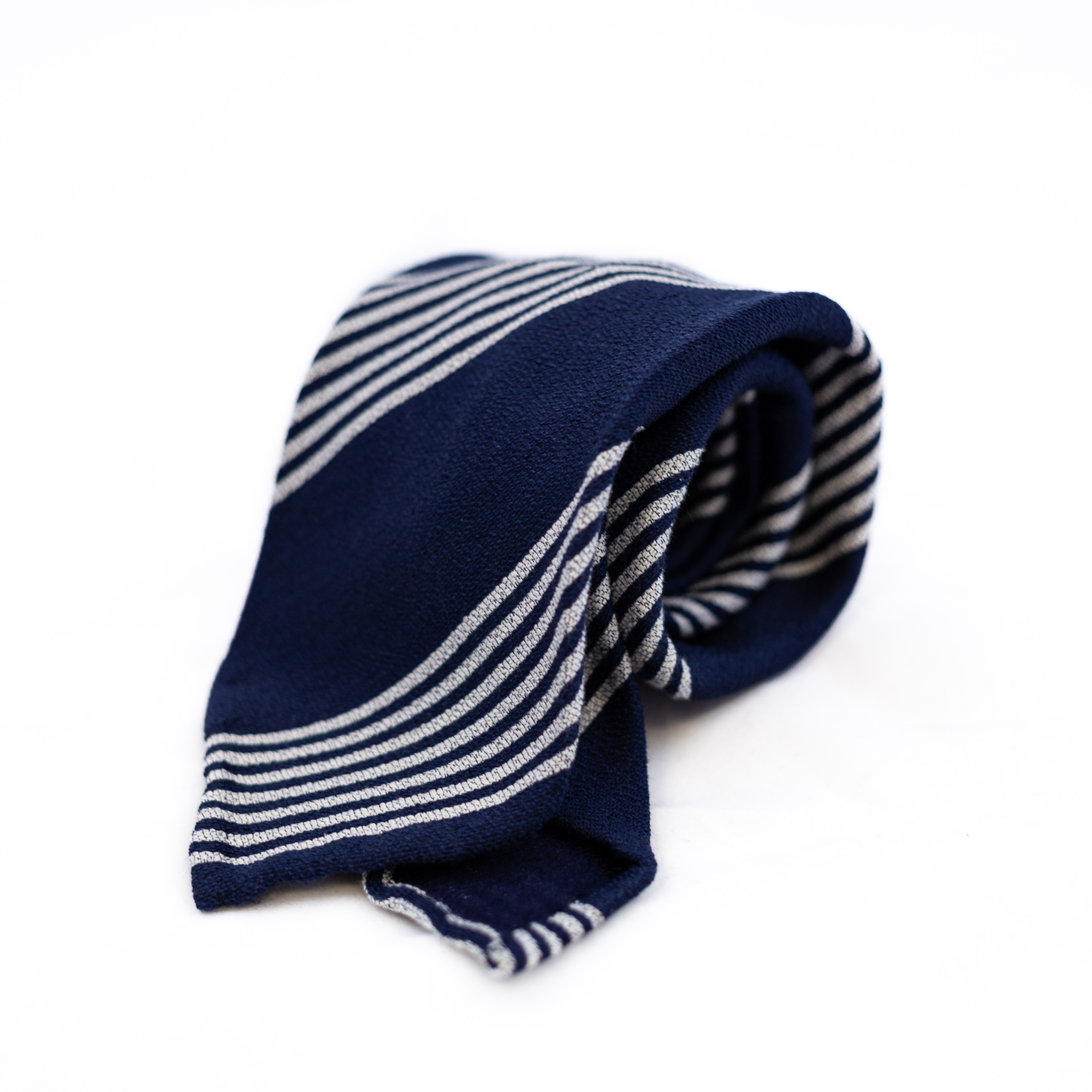 DLA 5-fold navy and white striped tie folded